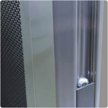 A close-up of a Prowler Proof frame showing the Hidden Installation Technology design. The image focuses on a recessed vertical channel containing a concealed fastener, with a mesh panel on one side and a smooth metal frame on the other. The components are tightly integrated, illustrating how H.I.T.® hides fixing points inside protected channels to improve aesthetics, tamper resistance, and overall security performance.